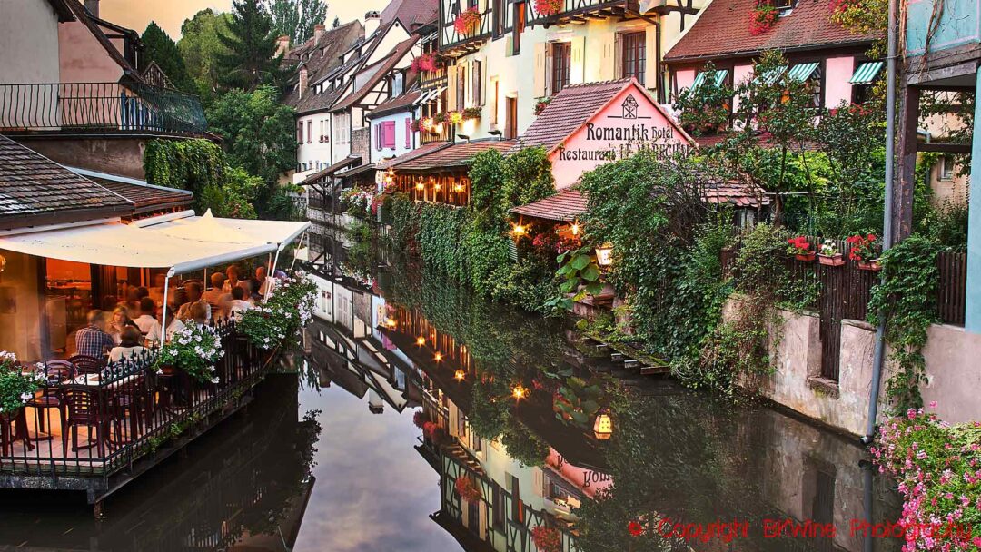 Little Venice (Petite Venise) in Colmar with quaint houses, flowers, and a restaurant on a canal