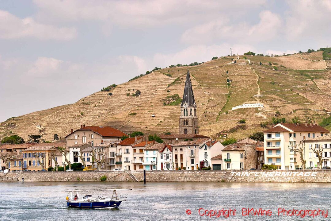 Terraced vineyards on very steep slopes in the northern Rhone Valley, Hermitage Hill and Tain village